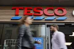 A Tesco Express outlet in central London.  Tesco, Britain's top supermarket player, has a popular Clubcard programme which gives its holders discounts of up to half off their grocery bills. The other players, Sainsbury's, Aldi, and now, Amazon, are eyeing each other's pricing policies closely. 