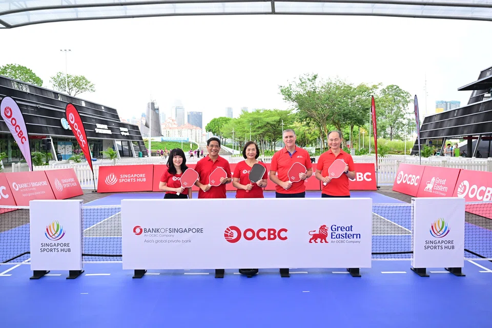 From left: OCBC head of group brand and communications Koh Ching Ching; Bank of Singapore CEO Jason Moo; OCBC CEO Helen Wong; Great Eastern CEO Greg Hingston; and KASM CEO Quek Swee Kuan at the Sports Hub on Oct 25.