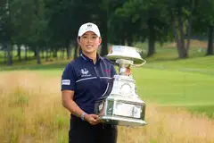 Yin Ruoning with the trophy after winning the KPMG Women's PGA Championship at the Baltusrol Golf Club in New Jersey in June 2023.