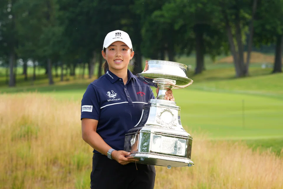 Yin Ruoning with the trophy after winning the KPMG Women's PGA Championship at the Baltusrol Golf Club in New Jersey in June 2023.