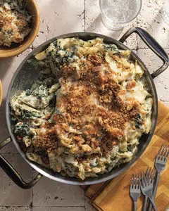 Phoebe Lapine's version of mac and cheese is inspired by the spinach artichoke dip sold at US chain California Pizza Kitchen.