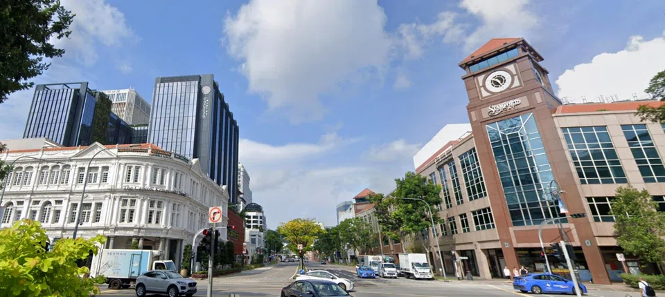 Stamford House (left) is part of the Capitol Singapore site. Across the road, the building with a clock tower is Stamford Court.
