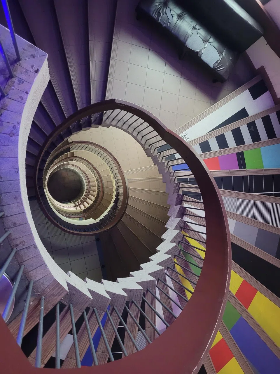  Golden Mile Tower was constructed in the Brutalist style, and has a striking spiral staircase that is frequently featured on Instagram. 