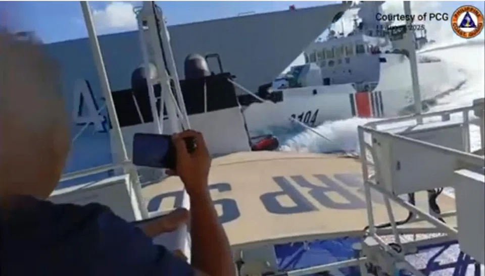 A Chinese Navy vessel (left) and a Chinese Coast Guard ship (right) collide while chasing a Philippines patrol boat near Scarborough Shoal in the disputed South China Sea, Aug 11, 2025.