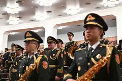 Members of the People's Liberation Army (PLA) band take their position to perform ahead of the Chinese People's Political Consultative Conference at the Great Hall of the People, Beijing, China, March 4, 2024. China has the world’s second-largest military budget, but lags well behind the United States, its primary strategic rival. 