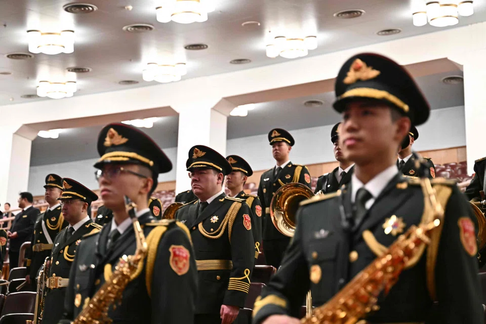 Members of the People's Liberation Army (PLA) band take their position to perform ahead of the Chinese People's Political Consultative Conference at the Great Hall of the People, Beijing, China, March 4, 2024. China has the world’s second-largest military budget, but lags well behind the United States, its primary strategic rival. 