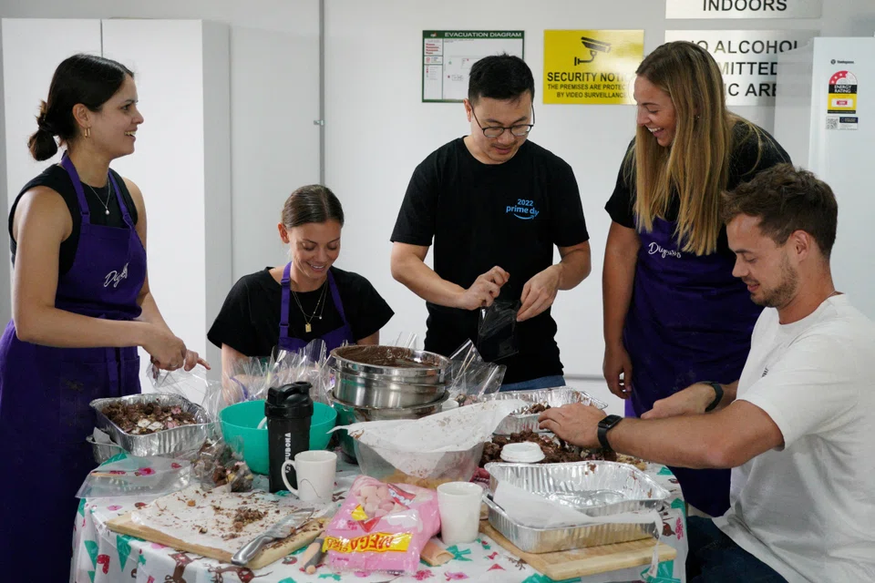 Volunteers at a temporary accommodations run by the Dignity charity in Campbelltown on Dec 1, where the shelter is already packed to capacity.