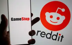 FILE PHOTO: GameStop logo is seen in front of displayed Reddit logo in this illustration taken February 2, 2021. REUTERS/Dado Ruvic/Illustration/File Photo