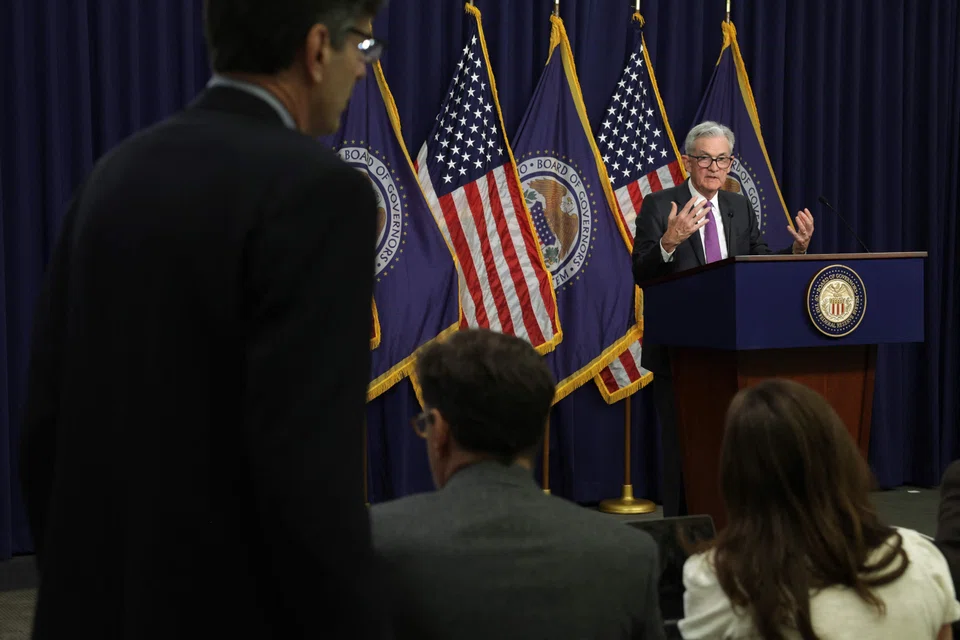 Stocks briefly took flight after Federal Reserve chair Jerome Powell (right) noted the progress the US central bank had made in bringing inflation down.