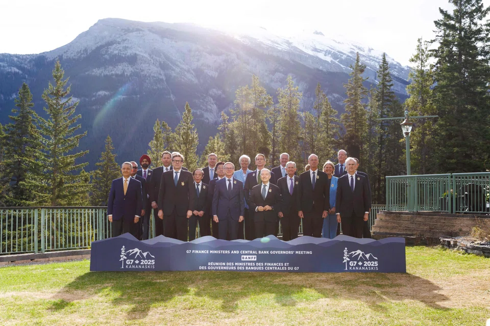 Dignitaries pose for a photo during the G7 Finance Ministers and Central Bank Governors' Meeting in Banff, Alberta, Canada, May 21, 2025. 
