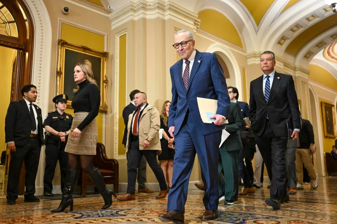 Senate minority leader Chuck Schumer departs after speaking to reporters at the Capitol in Washington, Jan 28, 2026.