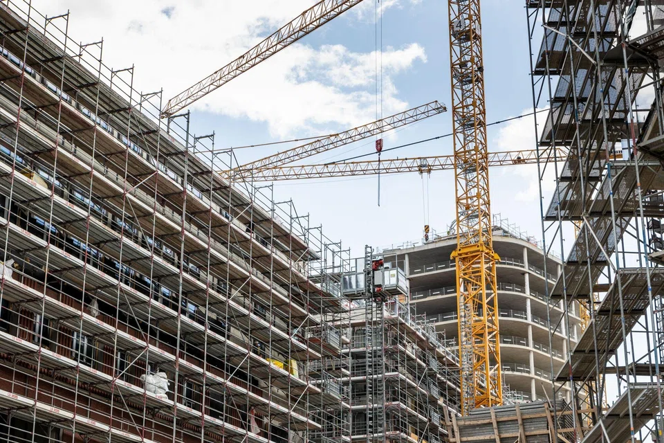 A construction site for apartment buildings in the HafenCity district in Hamburg, Germany. 22.2 per cent of residential construction companies are affected by project cancellations, the highest level since records began in 1991.