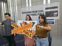 Avril de Torres (right) of the Center for Energy, Ecology and Development says the shift from loans to bonds is what facilitates continued fossil fuel investments.