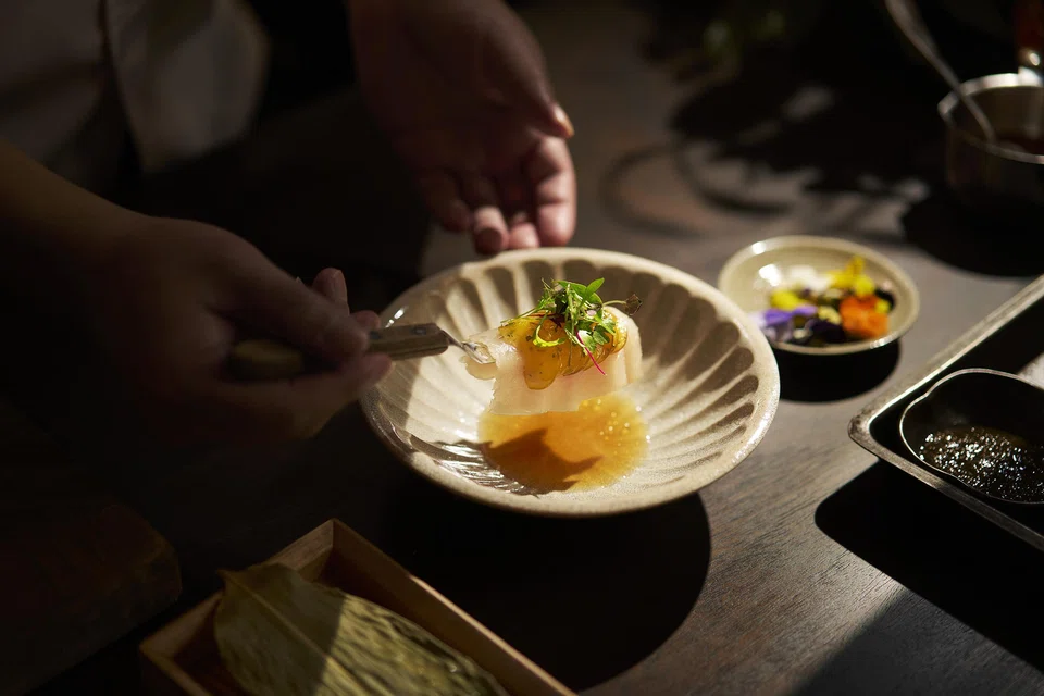 Kampachi with marinated plums in verjus.