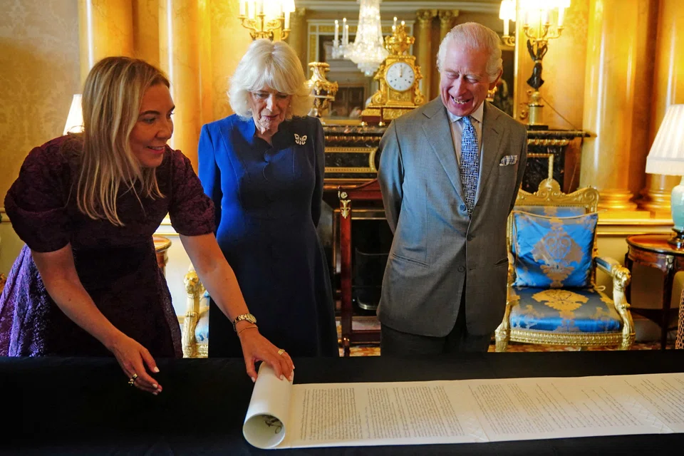 Antonia Romeo (left) with Britain's King Charles and Queen Camilla in May 2024, when the royals were presented with an official record of their Coronation. Romeo was then Clerk of the Crown in Chancery. Her promotion to head of the civil service comes 14 months after she was passed over for the same role in favour of Wormald.