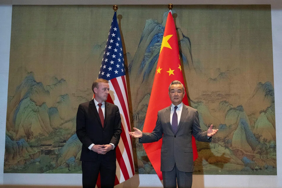 “The United States must not use bilateral treaties as an excuse to undermine China’s sovereignty and territorial integrity, nor should it support or condone the Philippines’ actions of infringement,” China's top diplomat Wang Yi (R) told US National Security Advisor Jake Sullivan.