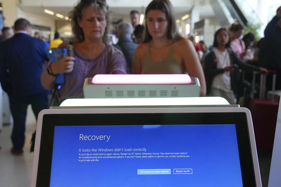 Passenger crowds had swelled at airports on Friday as dozens of flights were cancelled after an update to a programme operating on Microsoft Windows crashed systems worldwide.