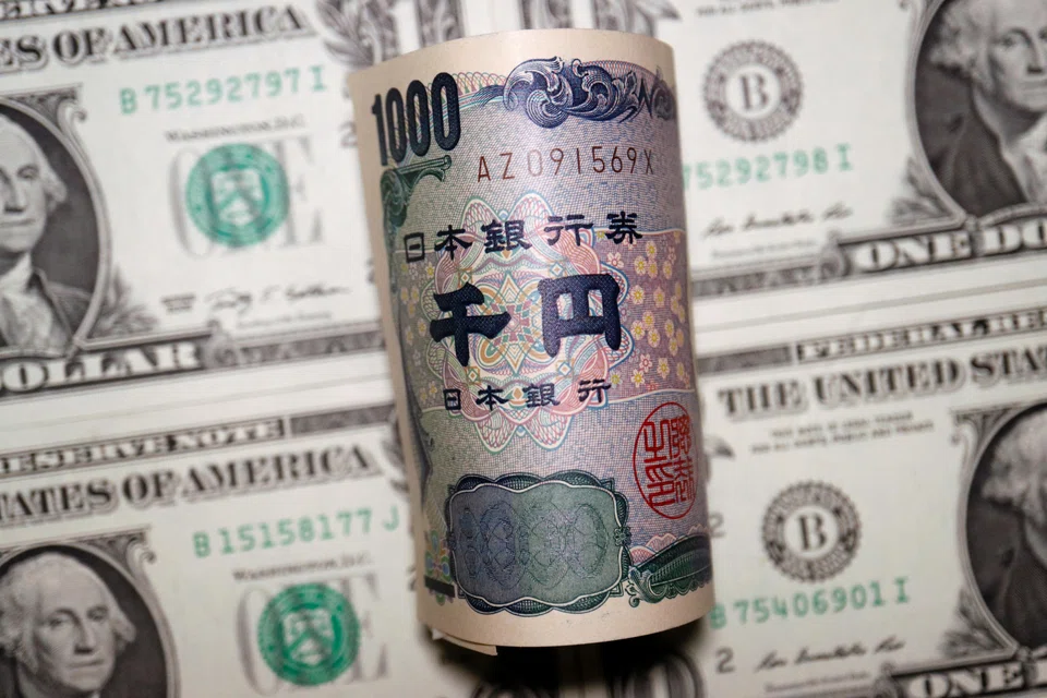 Japanese yen and U.S. dollar banknotes are seen in this illustration picture taken June 16, 2022. REUTERS/Florence Lo/Illustration