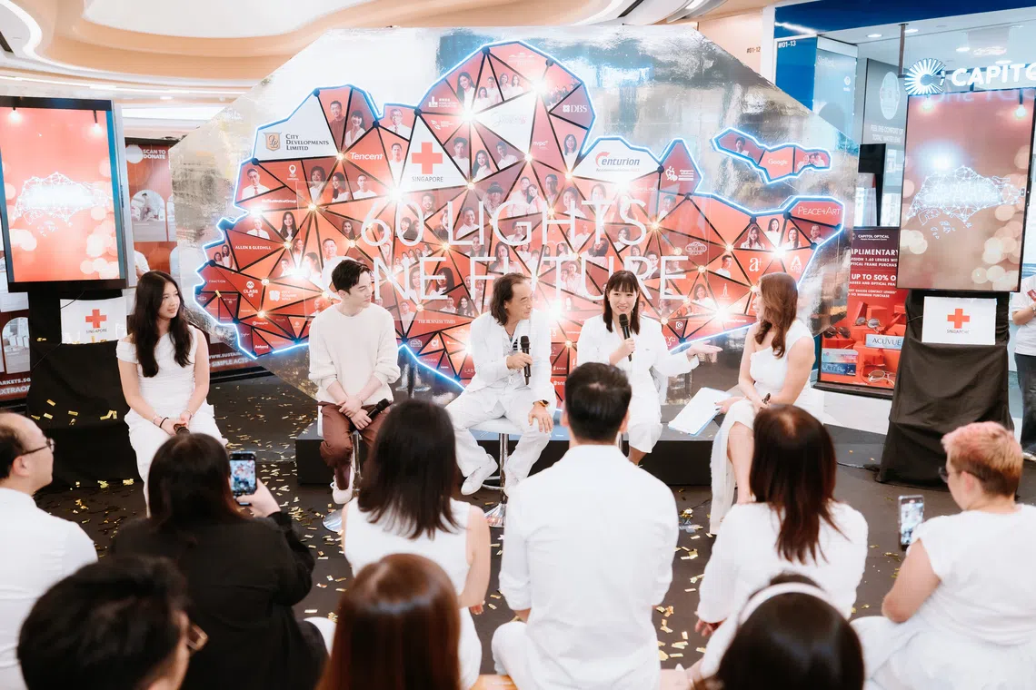 Some participants of the 60 Lights, One Future initiative at a panel session to discuss the future of giving in Singapore.