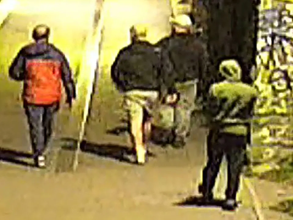 Four unidentified men, all wearing caps or hoodies, were seen in CCTV images carrying bags in the early hours. 