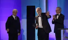 Francis Ford Coppola (centre) gestures on the stage after receiving the 50th AFI Life Achievement Award from George Lucas (left) and Steven Spielberg (right) at Dolby Theatre in Los Angeles on Apr 26.
