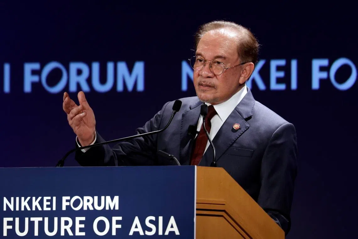 epa13027622 Malaysia's Prime Minister Anwar Ibrahim speaks during the 31st Nikkei Forum 'Future of Asia' in Tokyo, Japan, 10 June 2026. The Nikkei Forum 'Future of Asia' is an international gathering of political, economic, and academic leaders from the Asia-Pacific region.  EPA/FRANCK ROBICHON