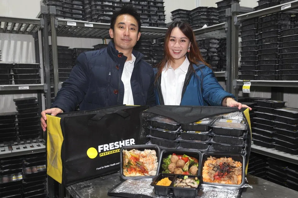 Jerome Seow (left) and Claire Francis, co-founders of Fresher Performance Meals. The home-grown meal prep services provider has seen sales grow more than 50% annually since 2019.