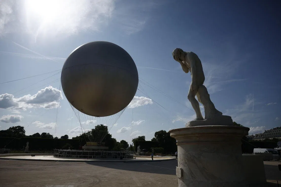 The Olympic cauldron at the Tuileries Garden in Paris. The cauldron will rise each evening from Jun 21 to Sep 14 until the 2028 Olympic Games in Los Angeles.