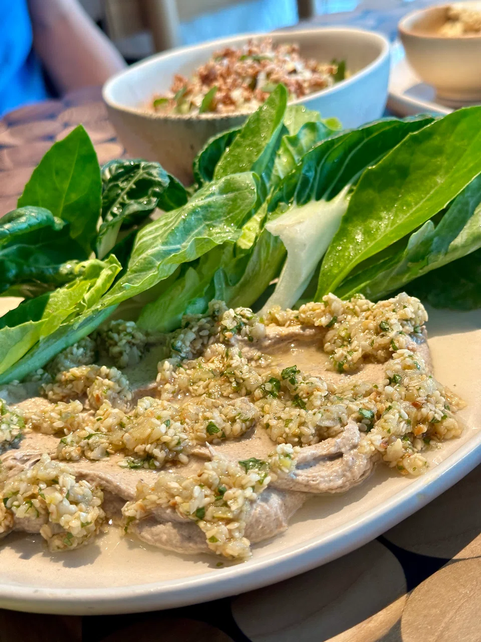 Earthy jackfruit hummus served with raw vegetables.