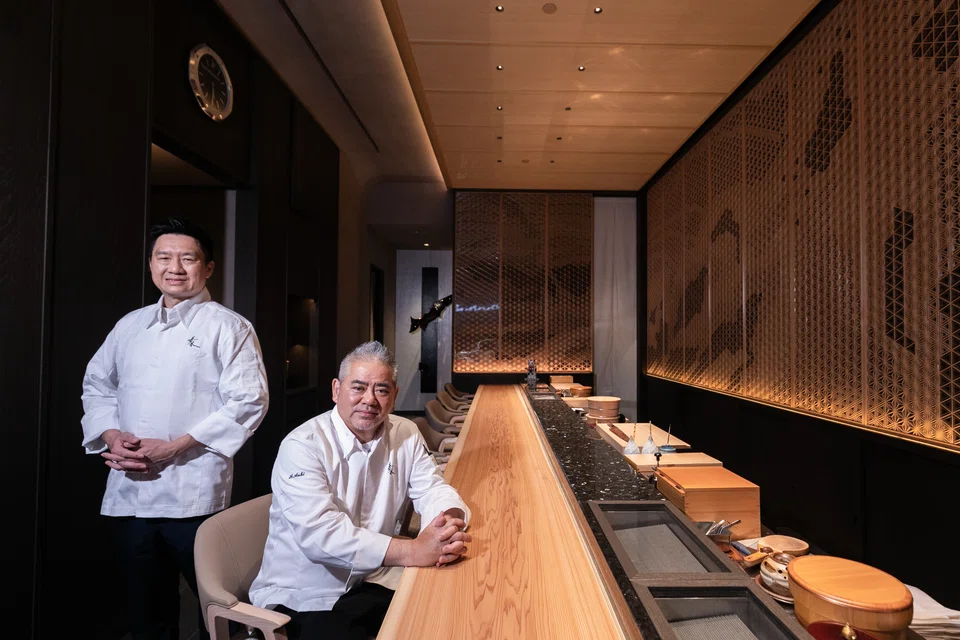 Chef Aoki (right) and his right-hand man Soh Chee Wai.