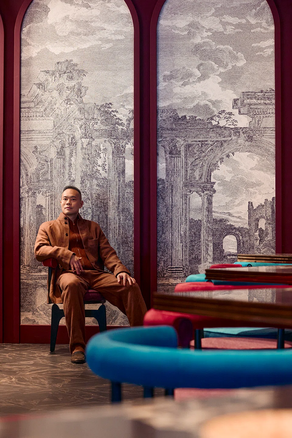 It was only after spending 10 years in the civil service that John Lim got to start his entrepreneurial journey. He wears a tobacco silk and linen Il Conte jacket, tobacco linen Oasi Lino bomber jacket, tobacco silk Oasi Lino one-pleat trousers, and dark brown suede leather moccasins, all from Zegna.