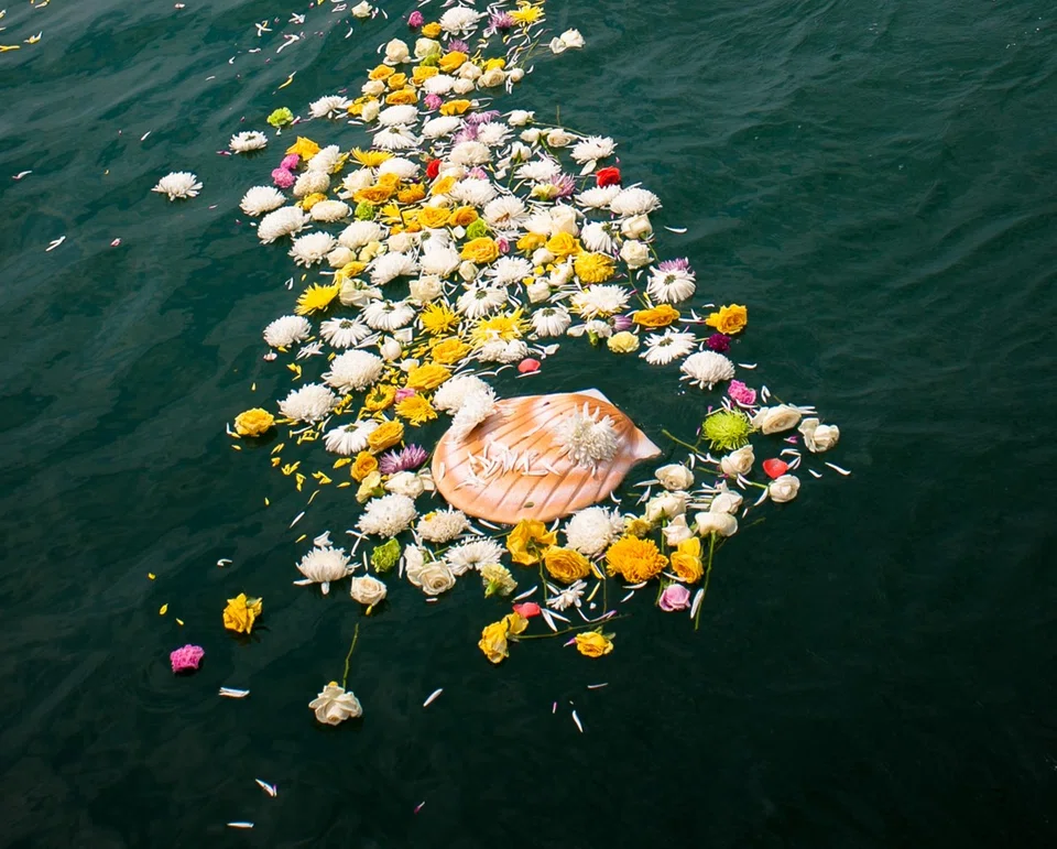 Ang Chin Moh Funeral Directors can help organise a sea burial with a biodegradable seashell urn.