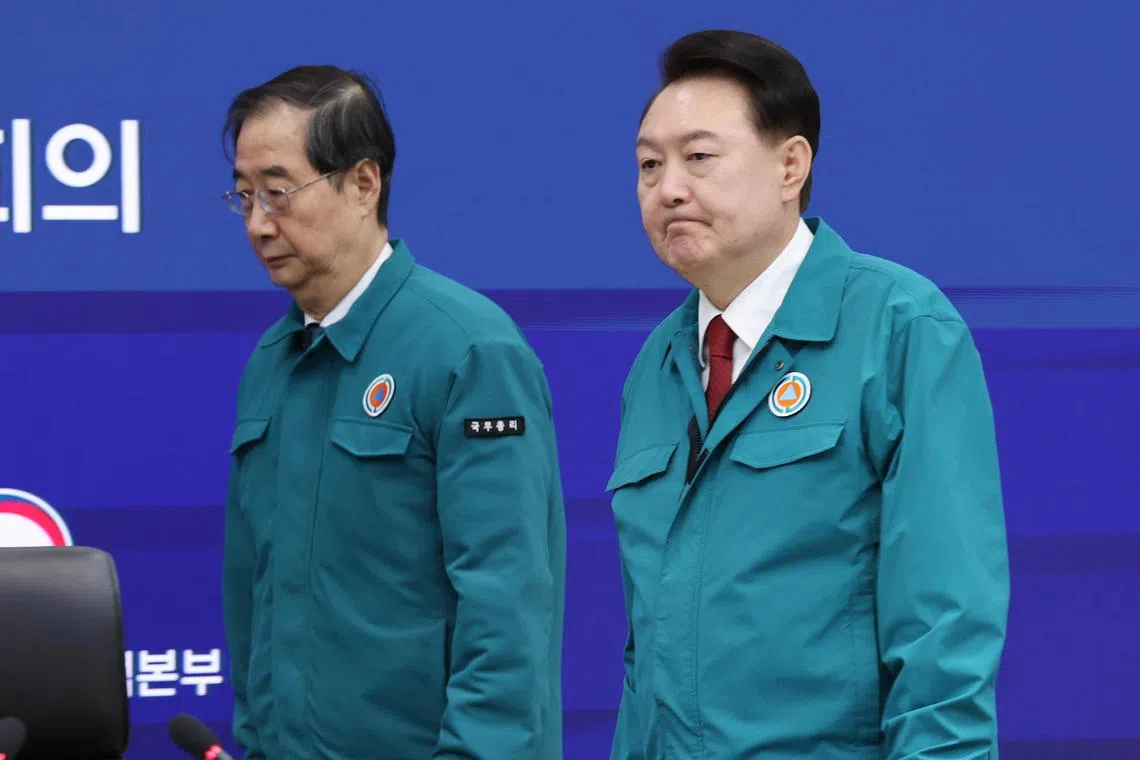 President Yoon Suk Yeol (R) has spearheaded a package of medical reform plans and taken a hard line against the protesters, moving to suspend their medical licences for defying return-to-work orders.