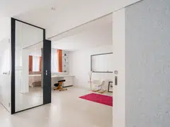 This three-room HDB flat features an oversized, full-height sliding partition door to allow flexibility in usage as a single or dual key unit. 