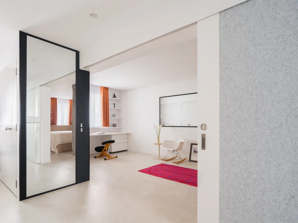 This three-room HDB flat features an oversized, full-height sliding partition door to allow flexibility in usage as a single or dual key unit. 