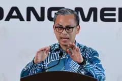 Malaysian Communications Minister Fahmi Fadzil said the government was bound by the principle of subjudice and would leave the former premier’s case to the judicial process.