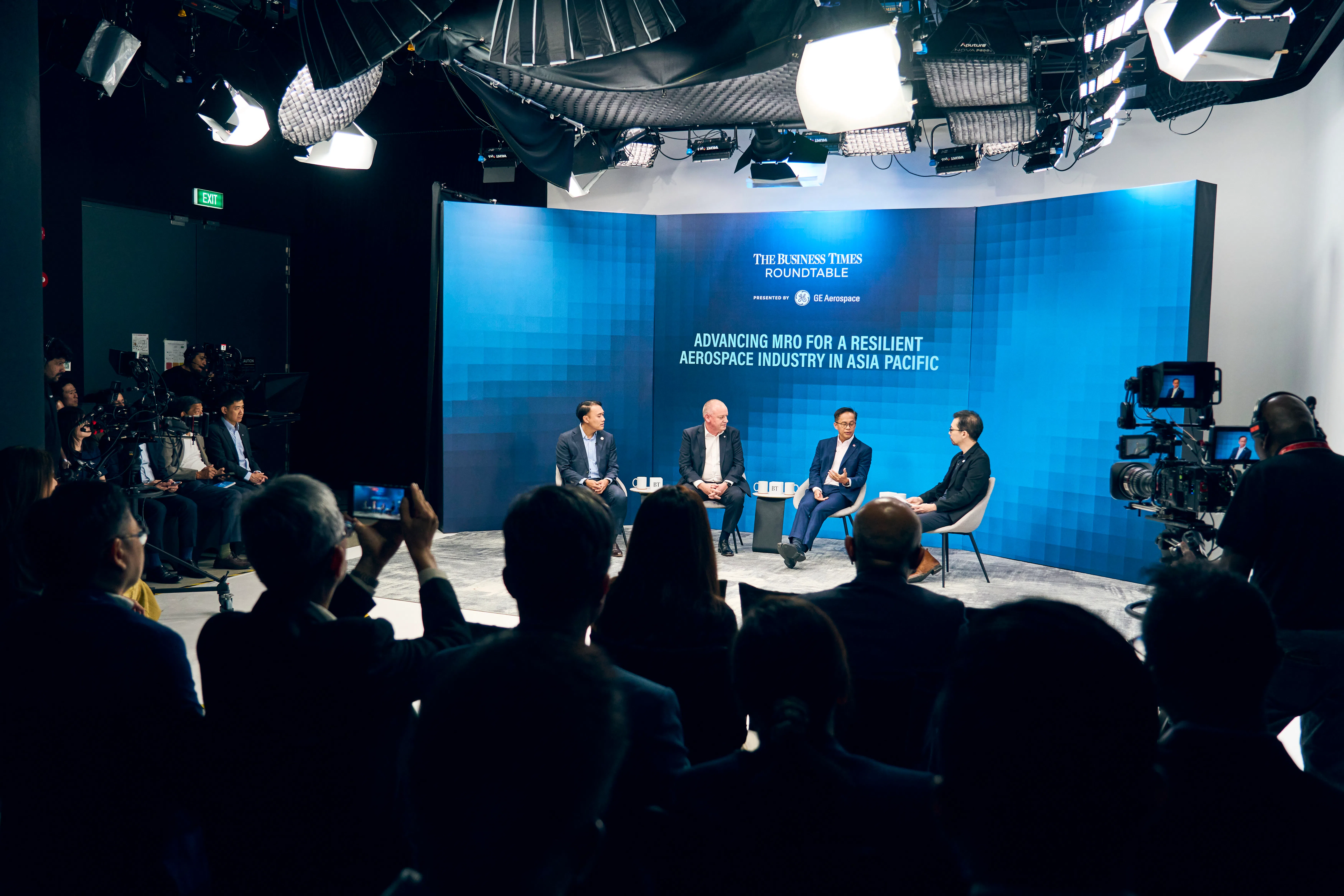 (From left) Zheng Jingxin, Singapore Economic Development Board's vice-president of mobility and industrial solutions; Iain Rodger, GE Aerospace's managing director of component repair in Singapore; Yip Hin Meng, ST Engineering's executive vice-president and head of aerospace MRO; Derryn Wong, The Business Times correspondent.