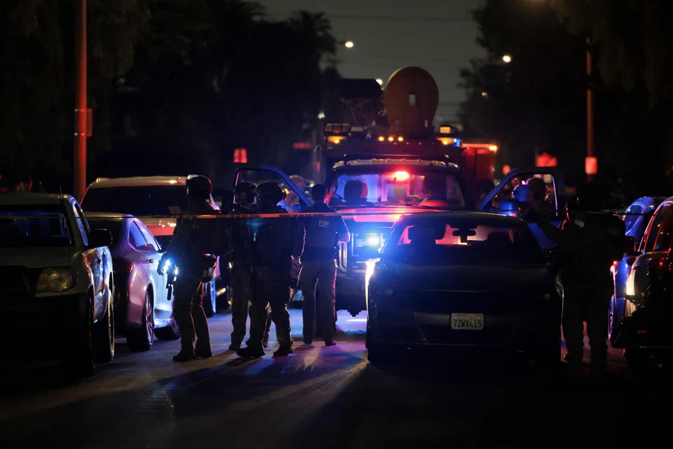 Armed FBI agents outside the residence associated with Cole Tomas Allen, the suspect in the shooting incident at the annual White House Correspondents' Association dinner, in Torrance, California, on Apr 25.