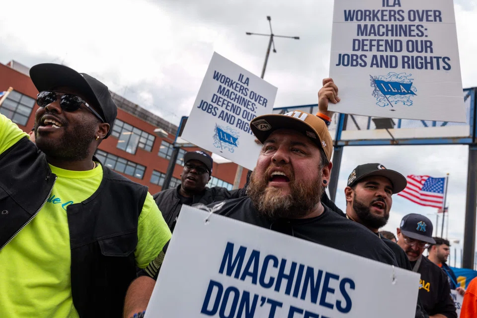 Striking workers demand for better working conditions at the Red Hook Container Terminal in Brooklyn, New York, Oct 1, 2024. 