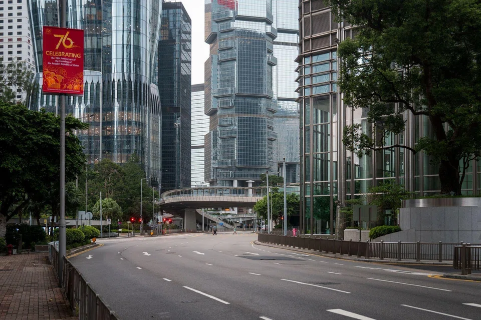 A near empty street in Central district ahead of Super Typhoon Ragasa in Hong Kong on Tuesday, Sep 23.