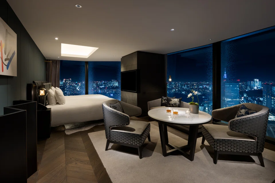 The Studio Deluxe Twin looks out to the city skyline.