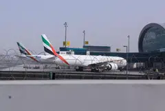 Planes parked at Terminal 3 of the Dubai International Airport, following the United States and Israel strikes on Iran, in Dubai, United Arab Emirates, March 2, 2026.