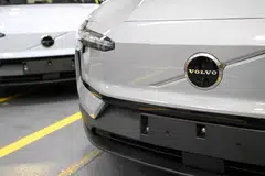 The cost cuts, part of a new “cost and cash action plan”, will include layoffs and a larger decrease in investment than earlier expected, the company says.