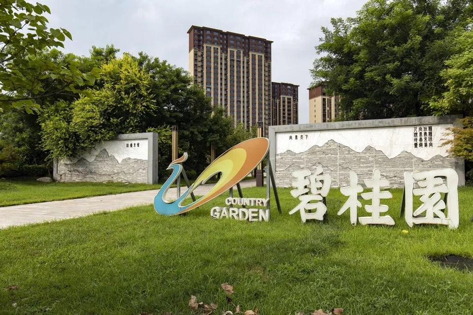 Country Garden says its usable cash has continuously decreased, showing “periodic liquidity stress” due to deterioration in the sales and refinancing environment, and the impact from various fund regulations.