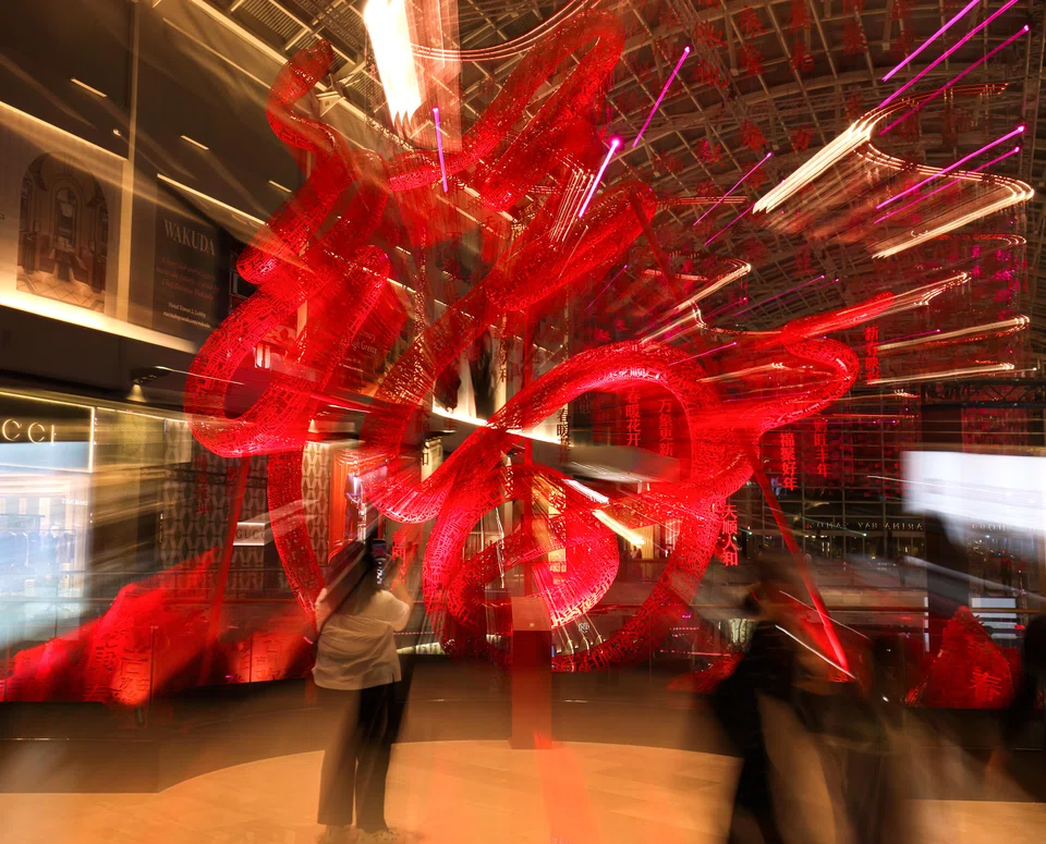 A stainless steel snake-shaped installation decorating The Shoppes’ Grand Colonnade at Marina Bay; in the Year of the Snake, investors will have to be nimble and potentially reposition portfolios.