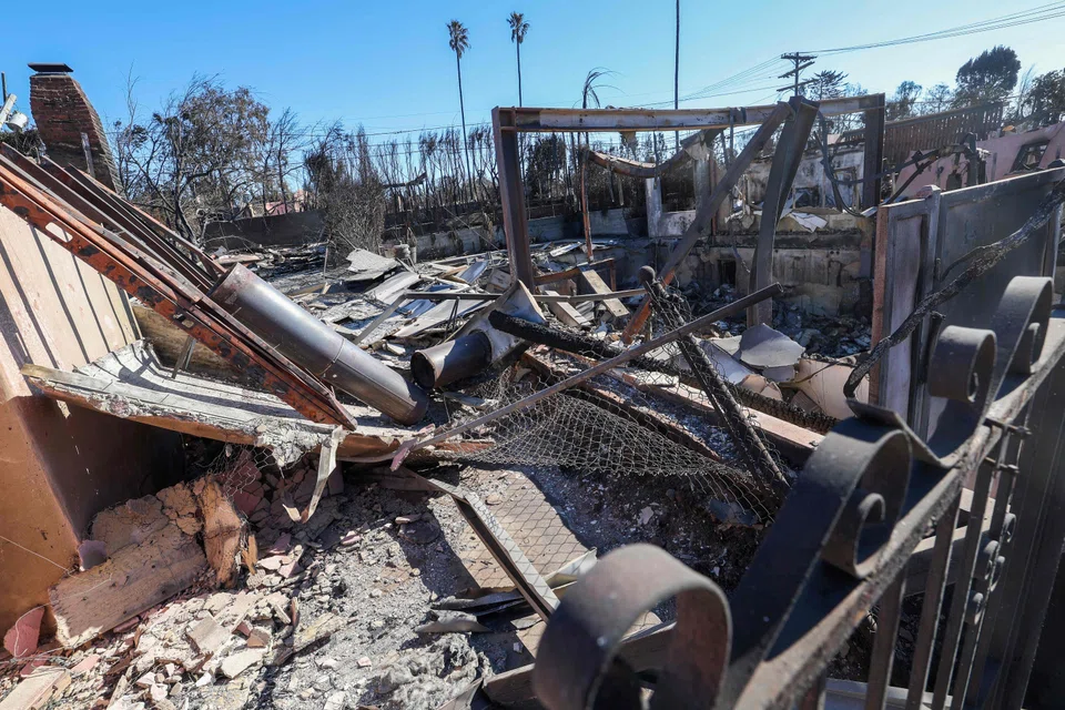 The fires that killed at least 24 people also destroyed more than 12,000 structures, many of them homes. 