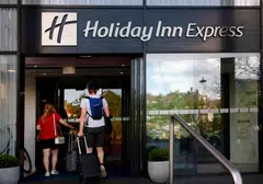 Hotel chain owners, including Holiday Inn owner IHG, have benefited from a tourism boom over the past year, although some US hoteliers expect a slowdown this year.