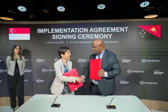 Singapore Minister for Sustainability and the Environment Grace Fu and Papua New Guinea Minister for Environment, Conservation and Climate Change Simo Kilepa at the signing ceremony of the implementation agreement between Singapore and Papua New Guinea. The agreement is aligned with Article 6 of the Paris Agreement.