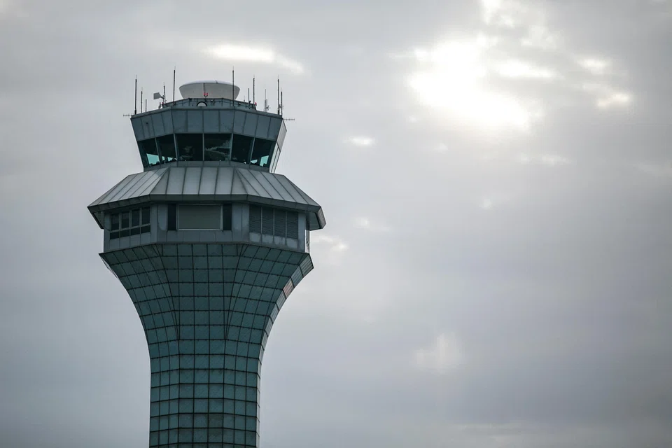 The air-traffic control tower at O’Hare International Airport in Chicago. The US is currently facing a shortfall of some 3,000 air-traffic controllers.