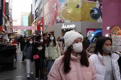 Tourists at Myeongdong shopping district in Seoul, South Korea, Jan 9, 2023. The Chinese Embassy in Seoul said the suspension will be adjusted if South Korea removes its “discriminative inbound restrictive measures” targeting China.